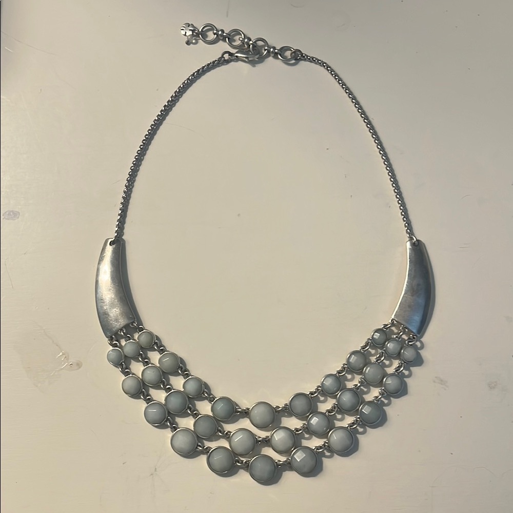 Lucky Brand statement silver necklace with light blue detailing.
